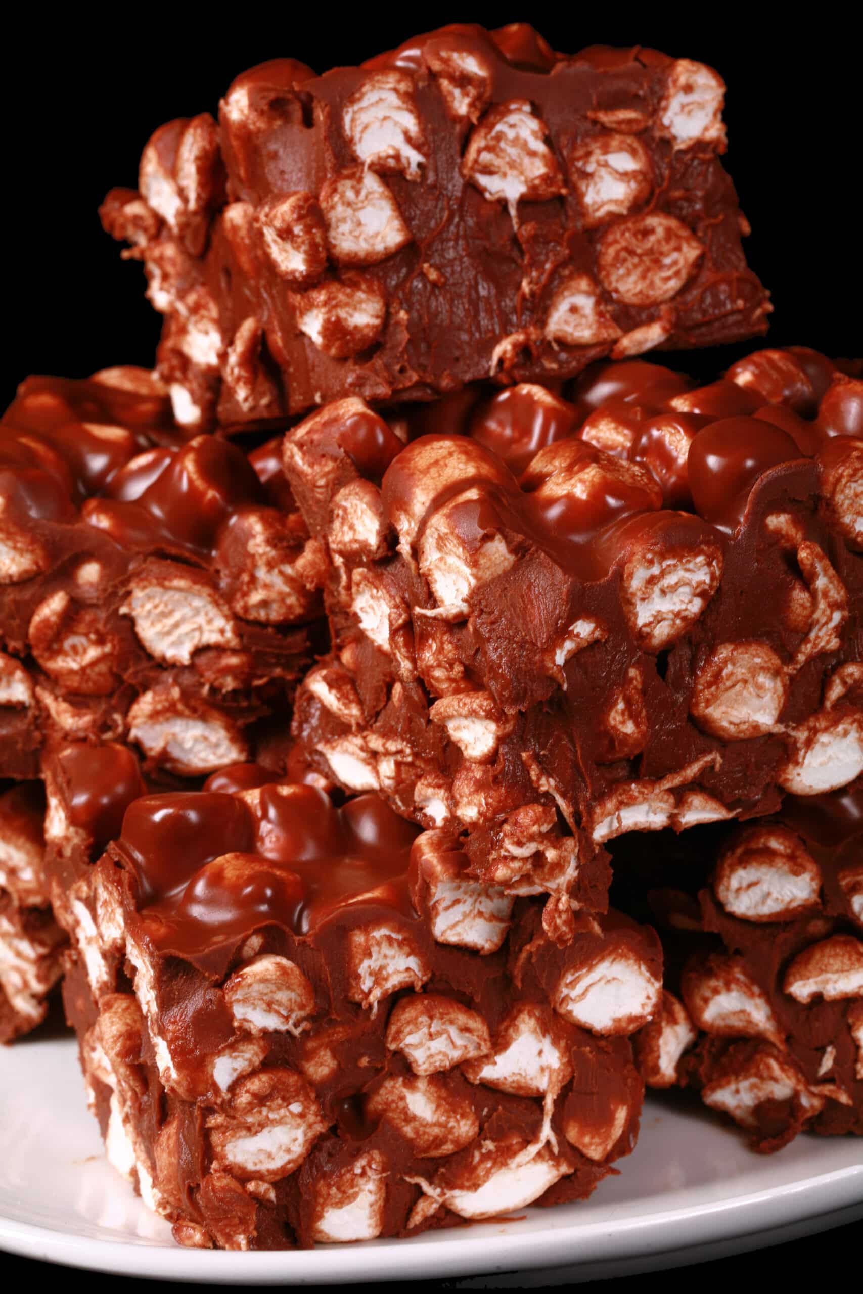 A plate of chocolate peanut butter marshmallow bars - Basically a chocolate fudge with mini marshmallows throughout..