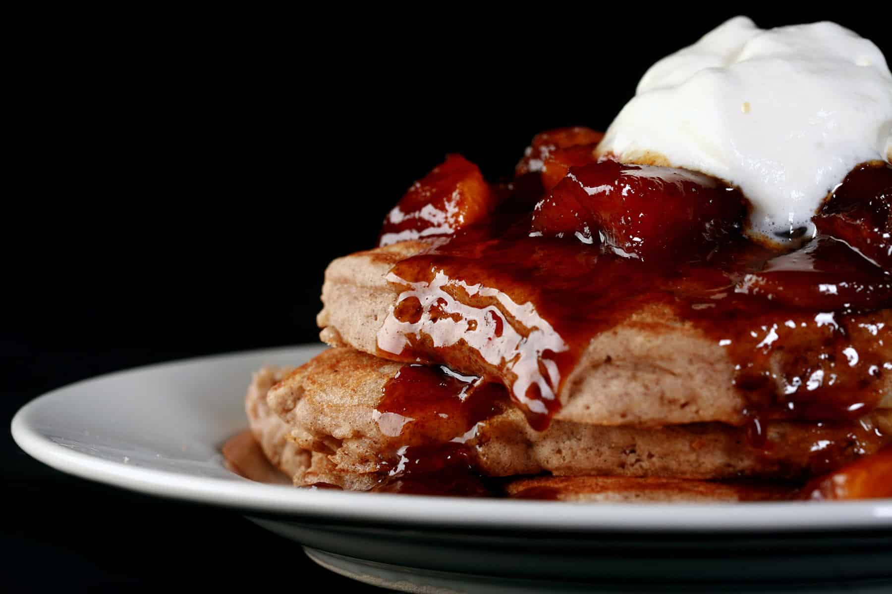 A stack of gluten free caramel apple pancakes.