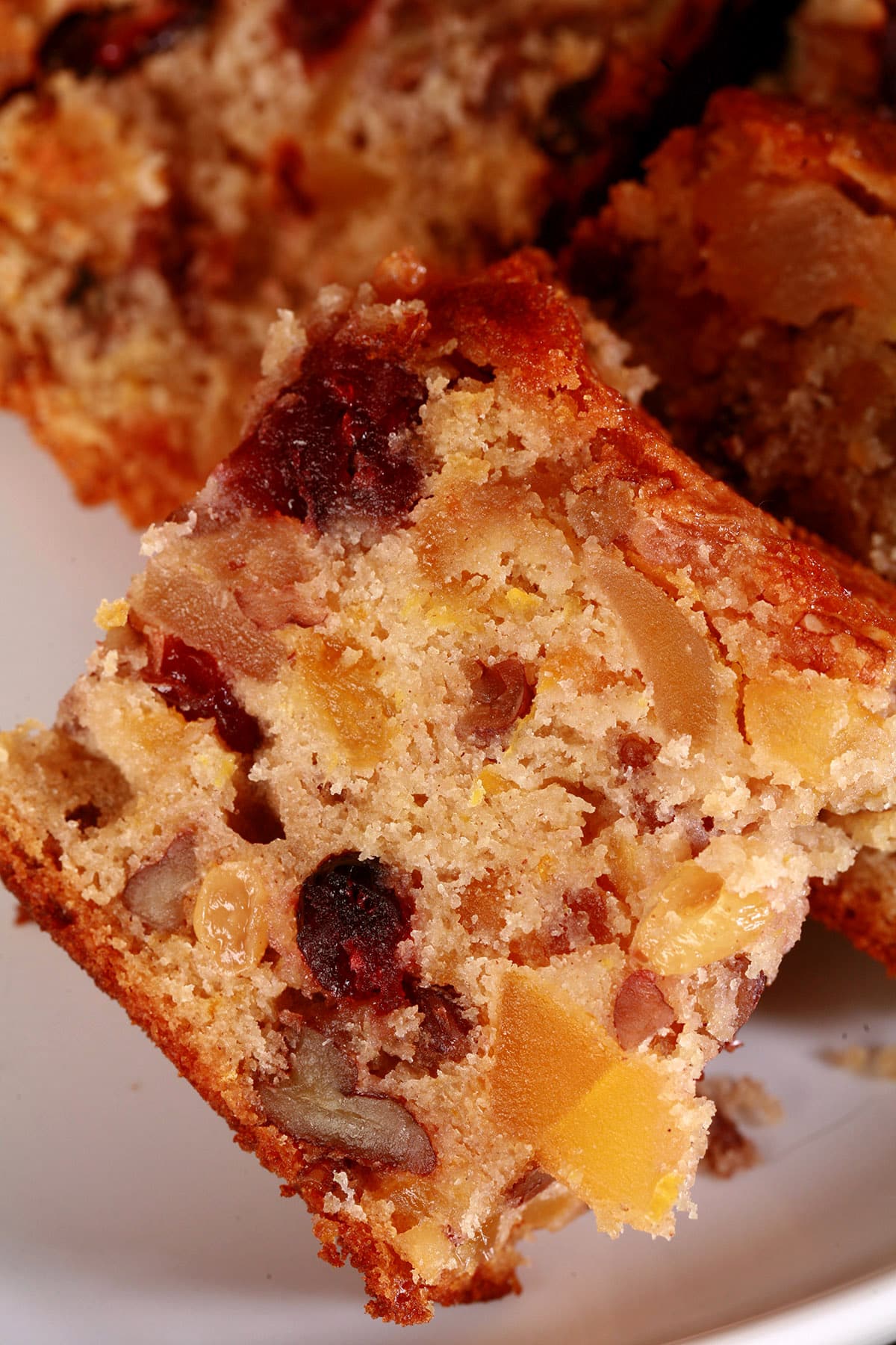 A sliced up gluten-free fruitcake.