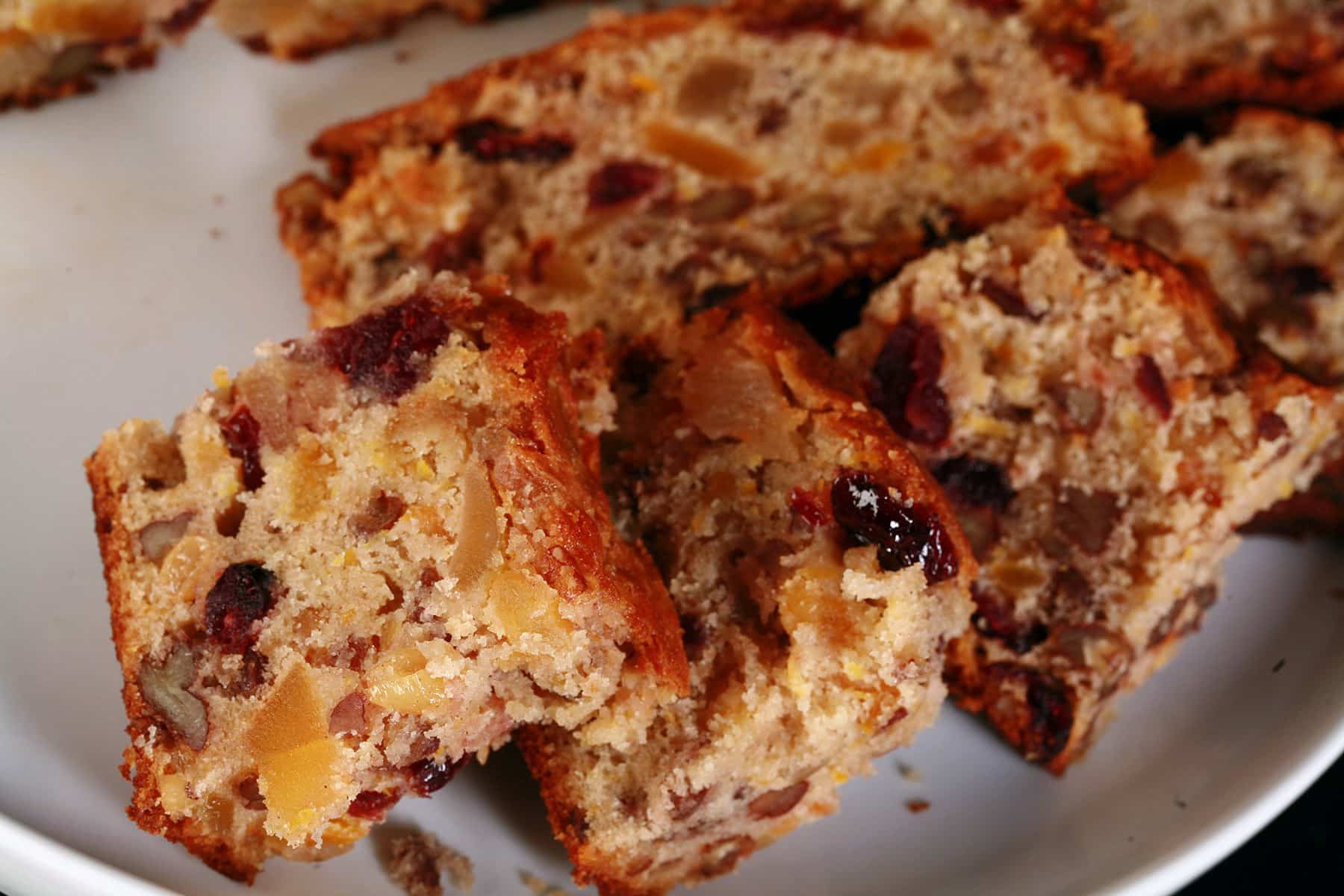 A sliced up gluten-free fruitcake.