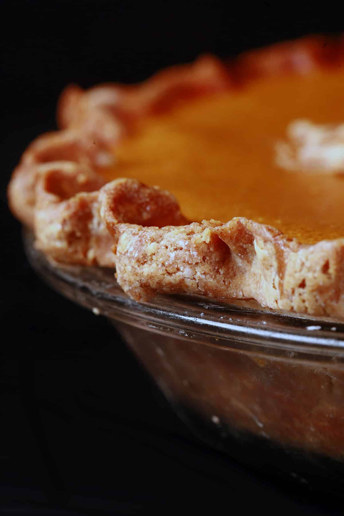A close up photo of a gluten free pumpkin pie crust.