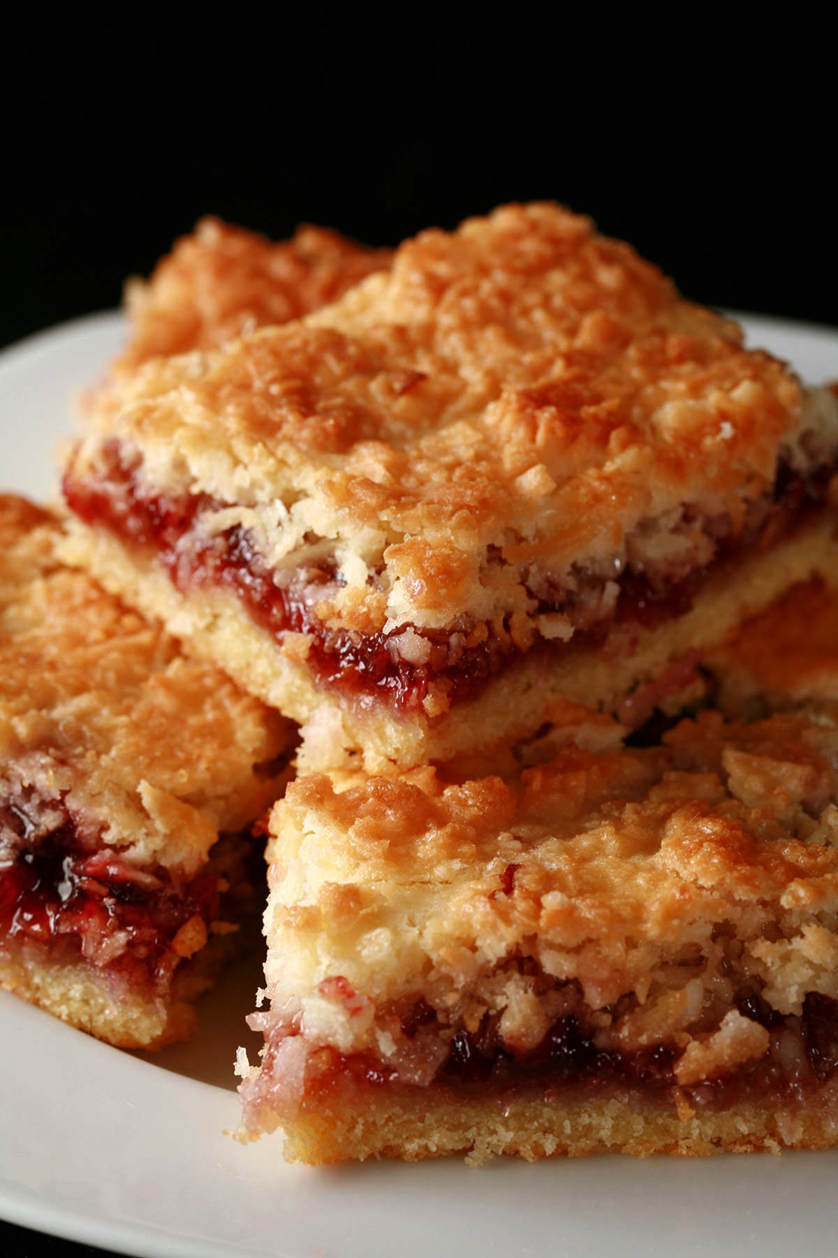 A plate of gluten-free raspberry bars.