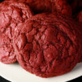 A close up photo of a plate of gluten-free red velvet cookies.