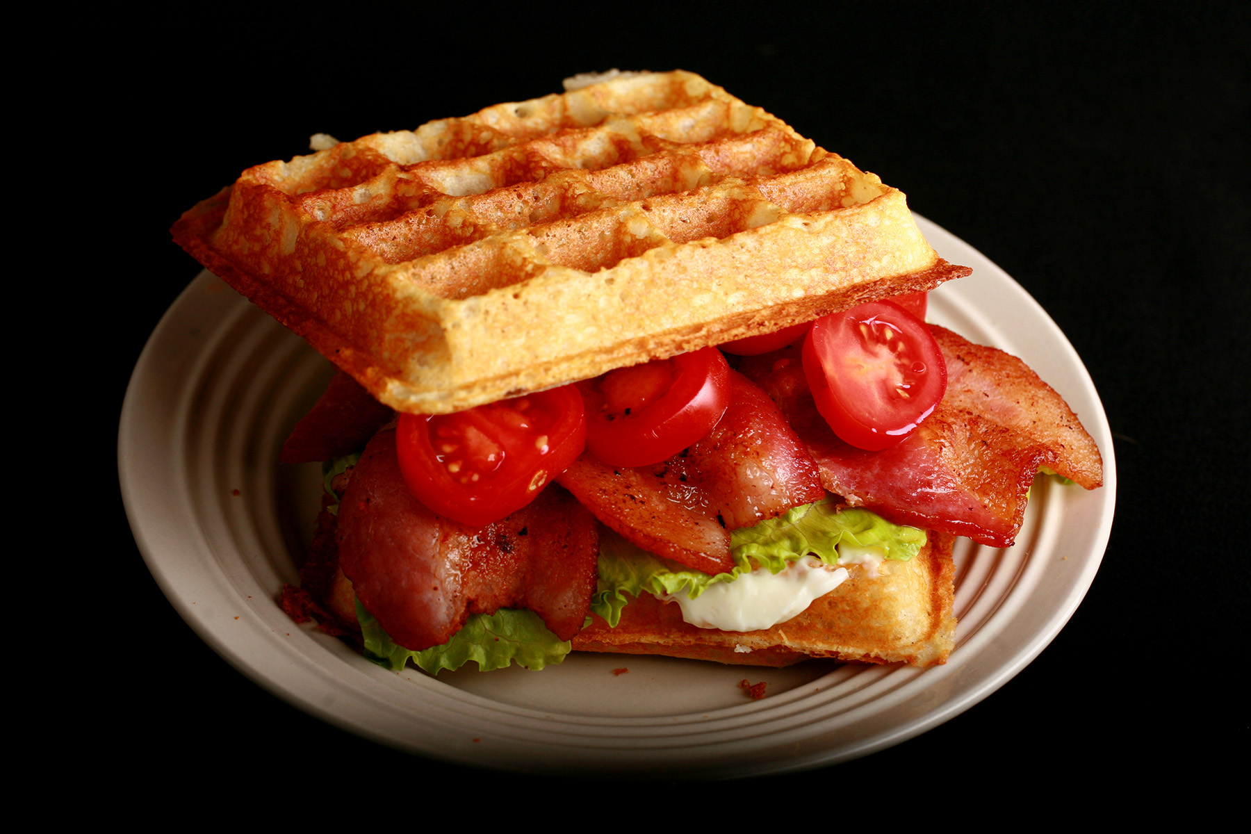 A BLT Sandwich made from gluten-free sourdough waffles.