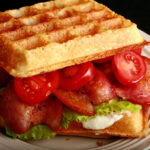 A BLT Sandwich made from gluten-free sourdough waffles.