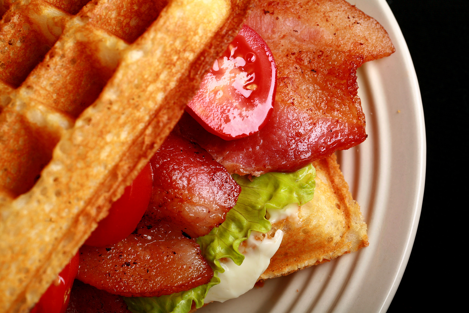 A BLT Sandwich made from gluten-free sourdough waffles.