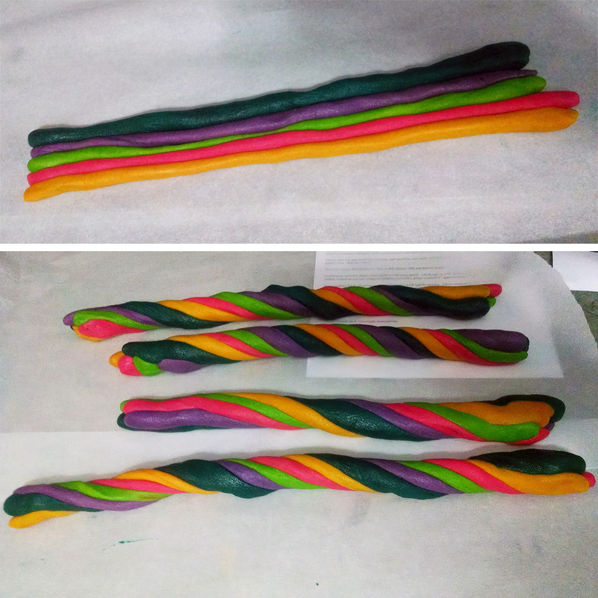 Long ropes of pink, yellow, green, teal, and purple cookie dough are lined up and twisted around each other.