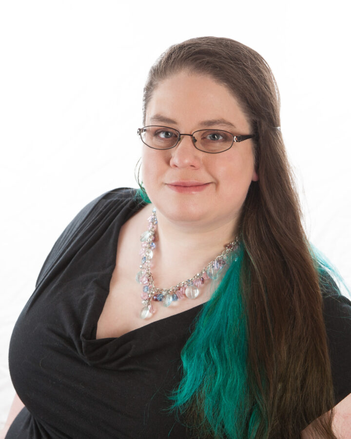 A middle aged woman with long brown hair.