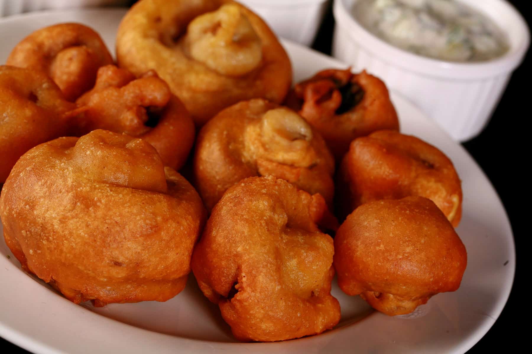 A plate of mushroom pakoras.