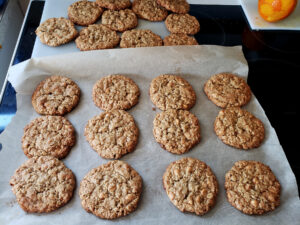 A tray of freshly baked butterscotch oatmeal cardamom cookies.