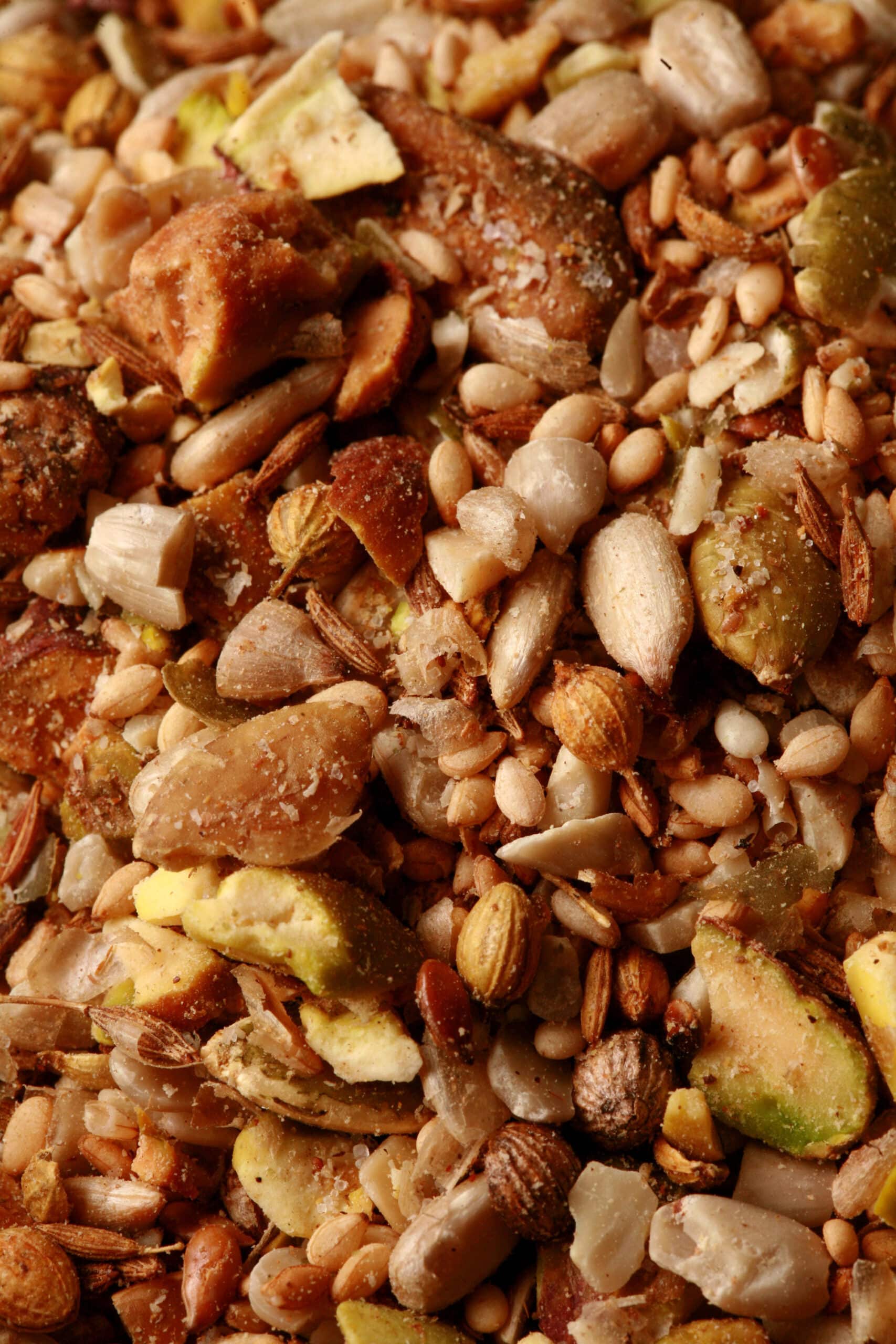 A small brown bowl of pistachio dukkag spice mix.