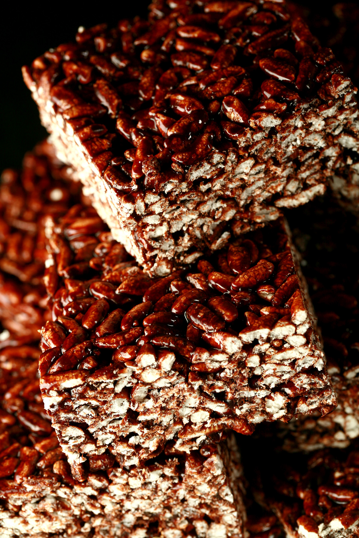 A close up view of large squares of puffed rice bars.