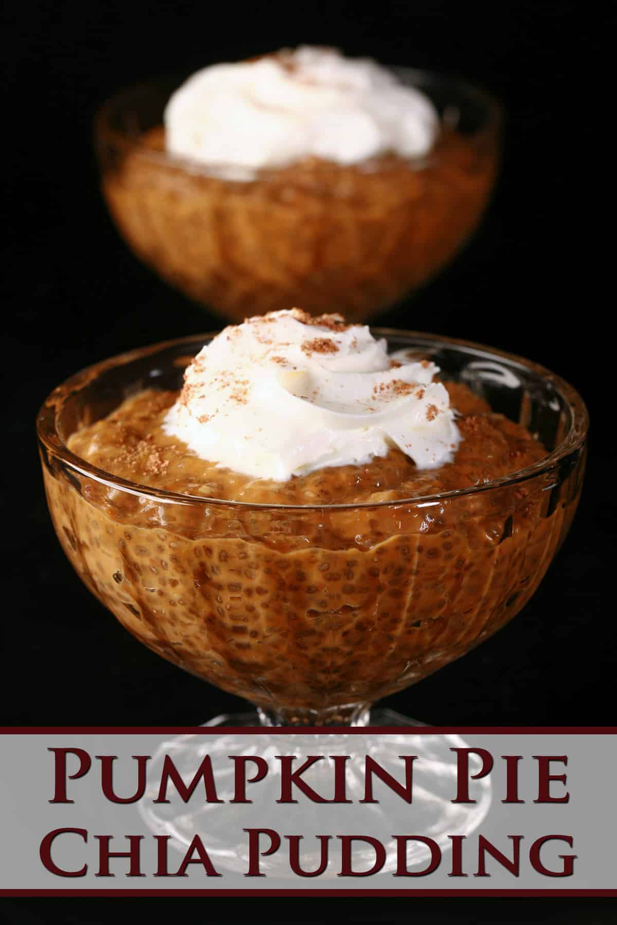 Pumpkin Chia Seed Pudding in a glass cup, topped with whipped cream and nutmeg.