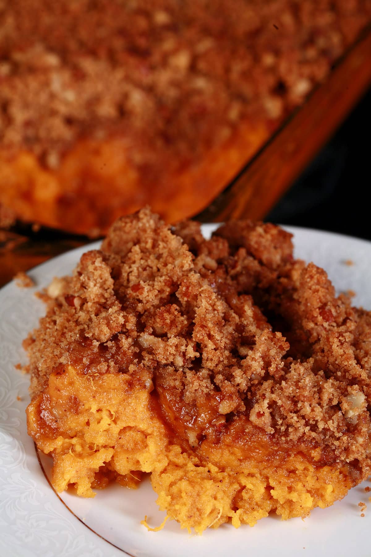 A serving of sweet potato souffle on a dish.