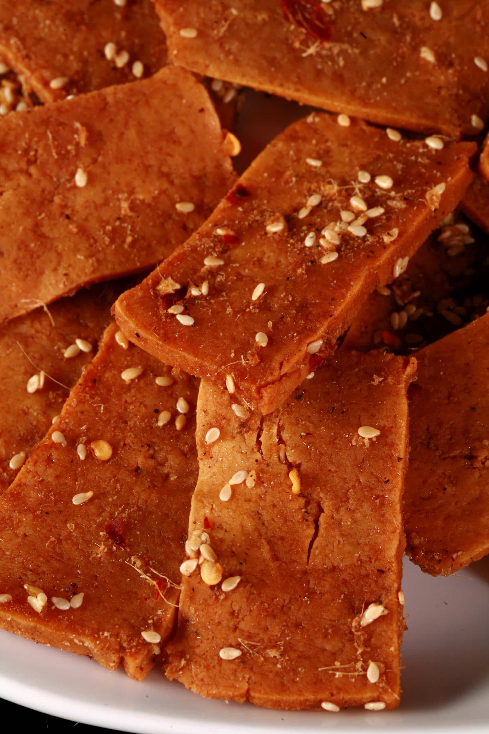 A plate of homemade tofu jerky.