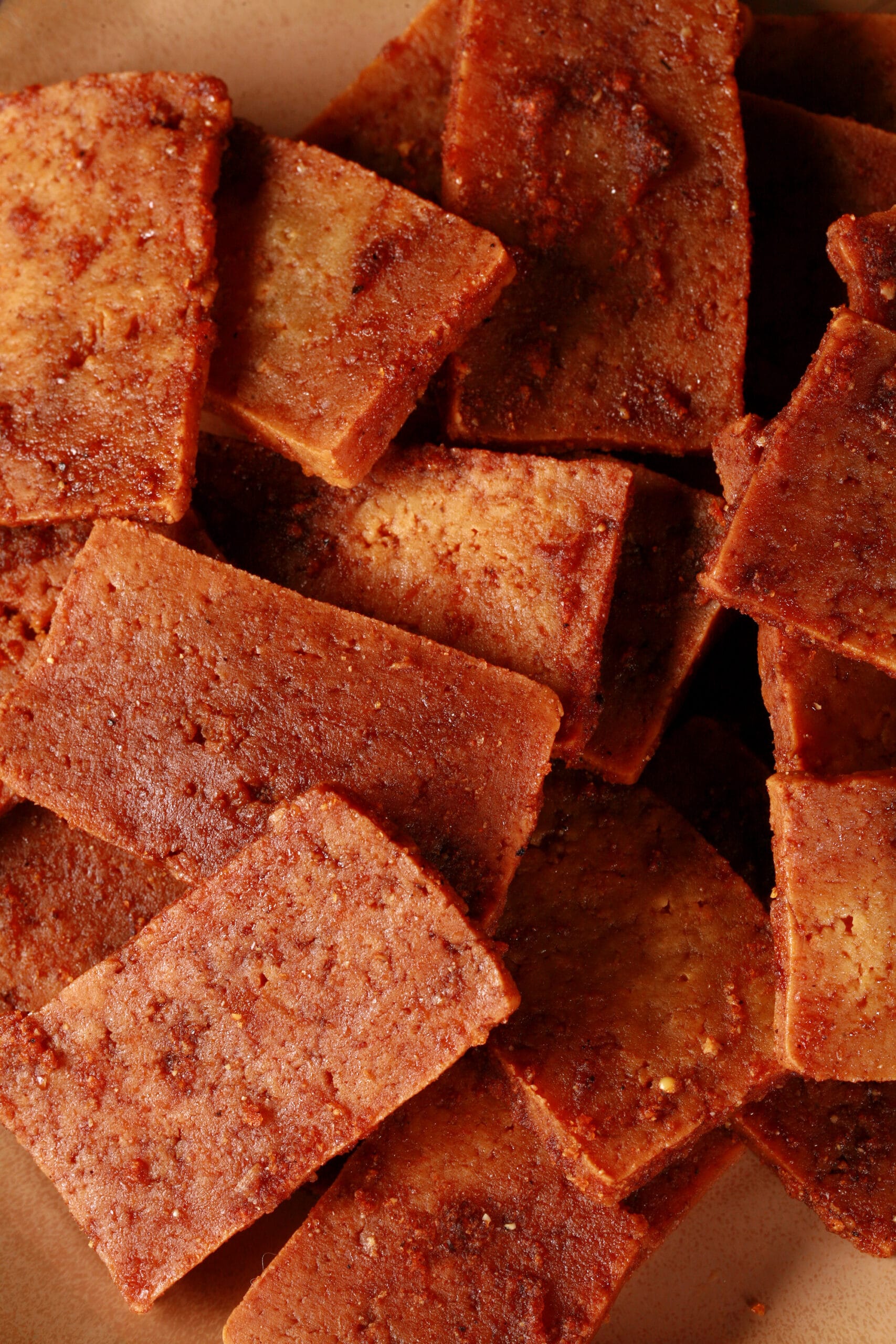 A plate of homemade vegan tofu jerky.