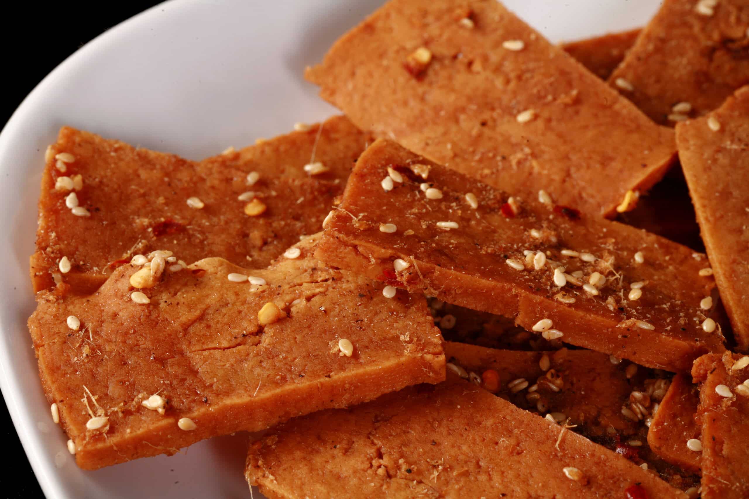 A plate of homemade tofu jerky.