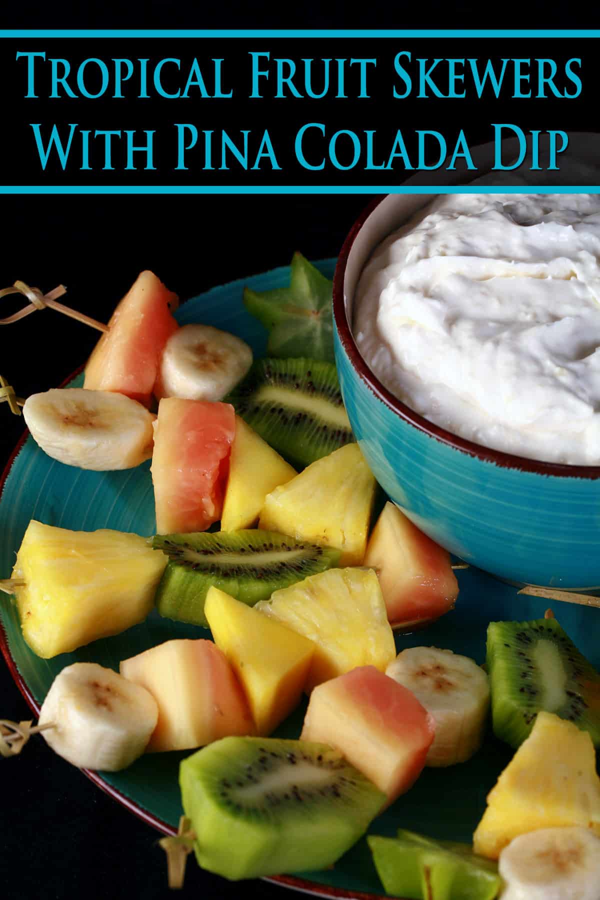 A plate of tropical fruit skewers and a bowl of pina colada cheesecake dip.